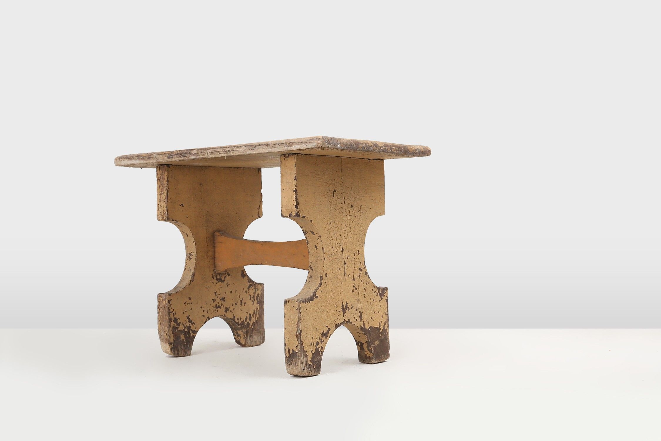 Beautiful shaped rustig low stool in painted wood, France ca. 1900thumbnail